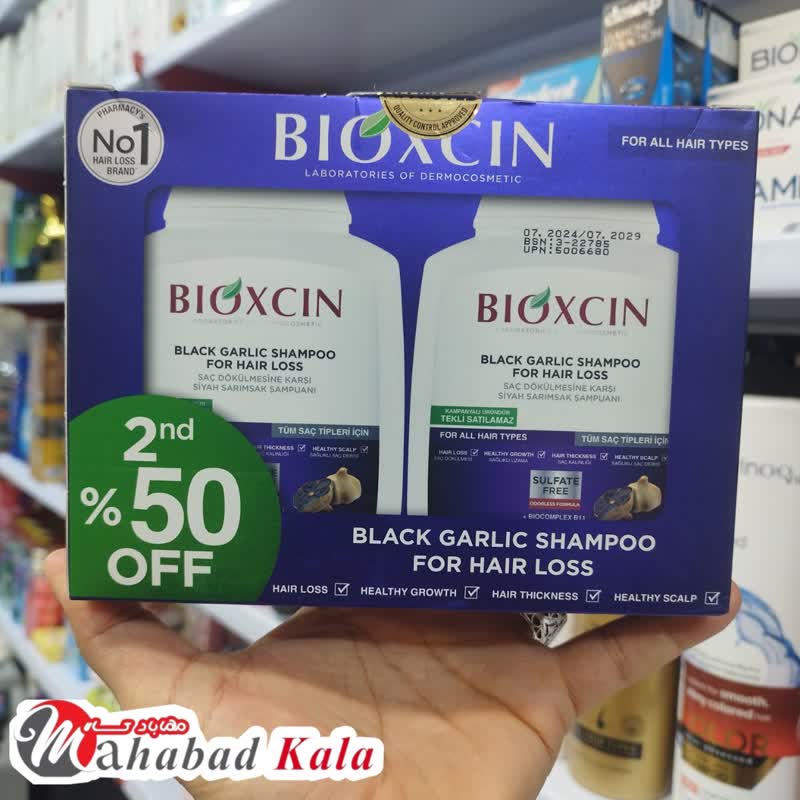 شامپو ضد ریزش مو BIOXCINحاوی عصاره سیر سیاه حجم 300 میل